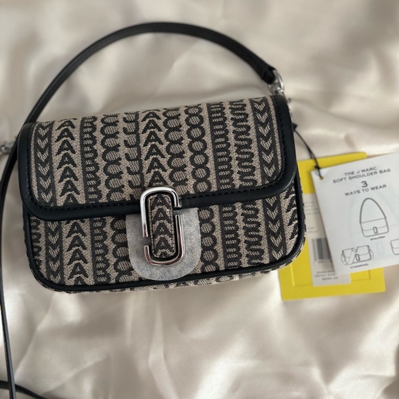 Marc Jacobs Handbags - 🎉 Marc Jacobs Monogram Black and Cream Crossbody Bag